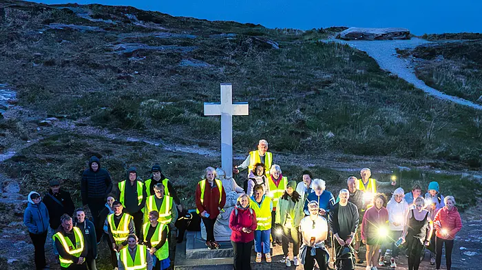 Some of the participants in the recent Darkness Into Light walk in Kilcrohane seen on top of the Goat's Path at daybreak. Photo courtesy of Donal O'Connell.
