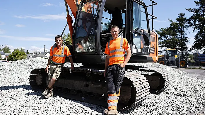 Tom Keavney and Stephen O’Brien from Plant Hire Ltd working at the tennis courts in Ballydehob.  (Photo: Carlos Benlayo)