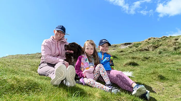Michelle, Eva and Isabelle Mockler from Reenascreena with Diesel the dog, enjoying their day in the sun at the Long Strand tractor, truck and car run which started at The Fish Basket, Castlefreke. The run was held in aid of Cancer Connect and the West Cork Jesters.  (Photo: David Patterson)