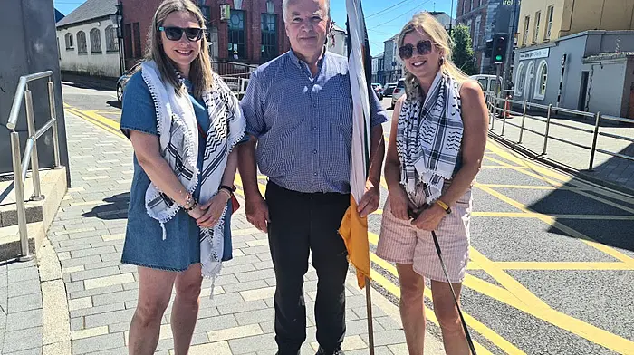 Aoife Long, Donnchadh Ó Seaghdha and Sinead Barry showing solidarity with Palestine at the Skibbereen weekly march. The march takes place every Saturday at 12.30pm to highlight the ongoing suffering of the Palestinians.