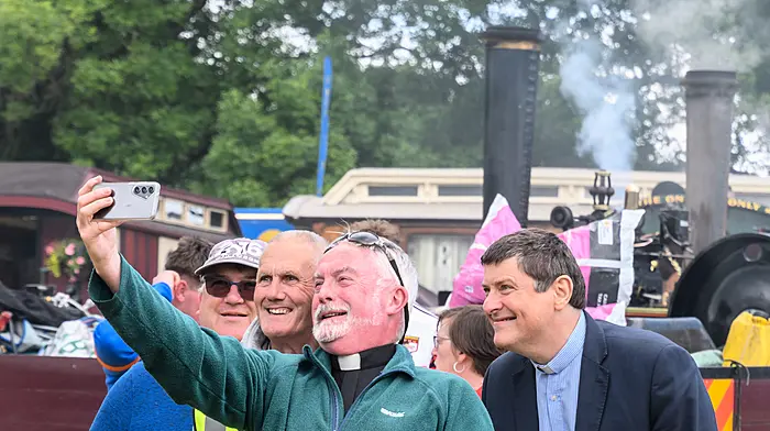 Rev Andrew Coleman OLM taking a selfie with Canon Denis MacCarthy, Aidan Holland of Clonakilty, and Rev Jeremy Nicholls at the Innishannon Steam & Vintage Rally. (Photo: David Patterson)