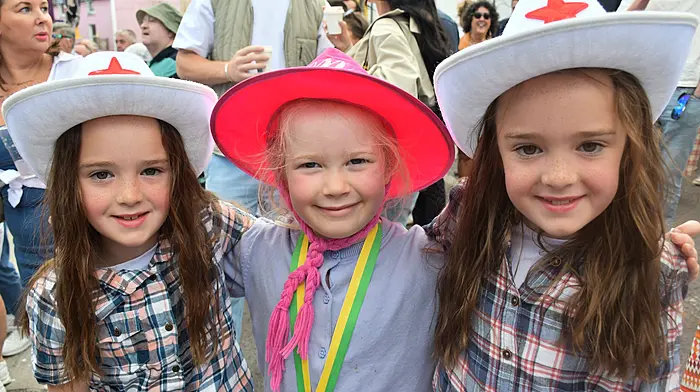 Ella and Ava Hurley, Schull and Grace Howard Hegarty, Lisheen, enjoying the tunes in Ballydehob. Astrid Quin from Kinsale having fun on the amusments at the Belgooly ag show. (Photos: Anne Minihane & David Creedon)