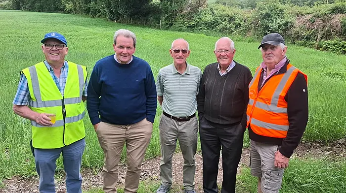 Club members Jerry O'Flynn, Liam Deasy, Richard O'Flynn, Jerry O'Leary and Ned O'Flynn at Castleview Pitch last Sunday during the GAA walk to every pitch on which the Ballinascarthy teams trained and played on, as part of the club’s 80th anniversary celebrations. In all, 18 pitches were visited over a 12 mile distance and flags were placed at each pitch and a photo captured of the landowner.