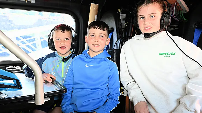 Rua and Flinn Lucitt and May O'Regan, all from Gaggin, Bandon, enjoying their visit onboard the Courtmacsherry Lifeboat, the Val Adnams, over the weekend.   (Photo: Martin Walsh)