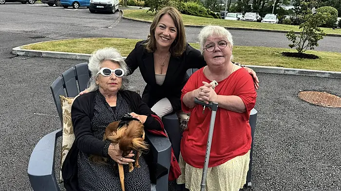 Cllr Caroline Cronin chatting with two well-known Schull residents, Mary Waldron (left) and Pauline Cotter at the official opening of the new community housing project, Ard na Mara.