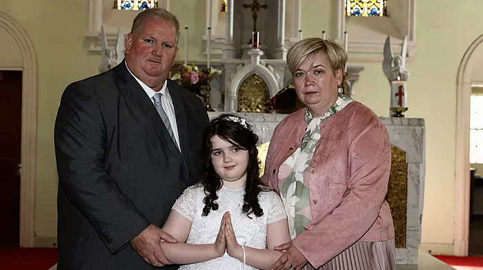 Brian and Maria O'Sullivan with their daughter Saoirse on the occasion of her First Holy Communion in Goleen church last Sunday. (Photo: Carlos Benlayo)