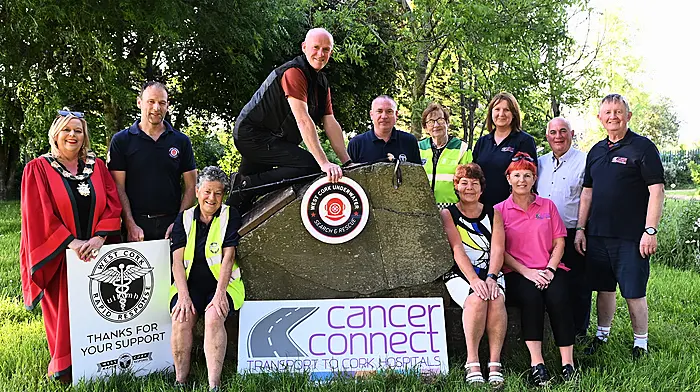 Clonakilty's John Callaghan will begin his climb of Mount Kilimanjaro on July 21st to raise funds for three West Cork charities; Cancer Connect, West Cork Rapid Response and West Cork Underwater Search and Rescue. Standing: Eileen Sheppard (mayor of Clonakilty), Eamonn Barry (West Cork Underwater Search and Rescue),  John Callaghan (climber), Liam Slattery (WCRR), Betty Hennessy (WCRR),  Helen O'Driscoll (manager, Cancer Connect),  Christy Dempsey (Cancer Connect) and Jim Murphy (Cancer Connect).  Seated: Dena O'Donovan (WCRR), Catherine Callaghan (John's wife) and Sinead Crowley (Cancer Connect.) (Photo: Martin Walsh)