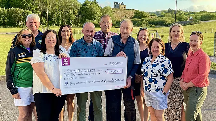 Ballinacarriga National School and Randal Óg GAA presented Cancer Connect with a cheque for €1,400 from the proceeds of their recent tractor run. Pat White and Sean O'Donovan collected the cheque on behalf of Cancer Connect. The organisers thanked all of those who helped run the event, those who sponsored raffle prizes and everyone who supported and came along on the day. Back: Frank O'Donnell, Geraldine Hurley, Dan O'Sullivan, Charlotte Dewar and Ruth McSweeney. Front: Lynn Holland, Laura Burchill, Sean O'Donovan, Pat White, Mary O'Donnell and Catriona Hennessy.