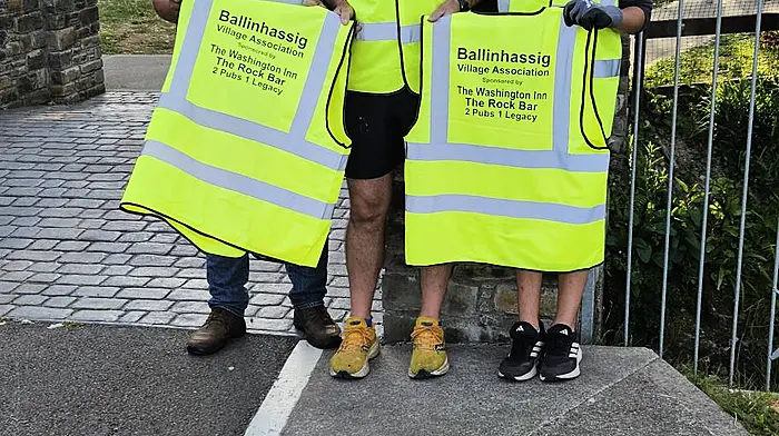 Paul O'Rourke from The Rock Bar and Washington Inn, who sponsored the high vis vests for the Ballinhassig Tidy Village Association, with Derry Finn and Charlie Kavanagh.