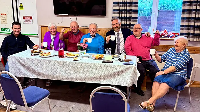 Minister Christopher O’Sullivan attending the Rossmore Theatre Group’s coffee day in aid of Cairde, Clonakilty Community Hospital. From left: Jason Collins, Maura Cal McCarthy, Diarmuid Lawlor, Ger Finn, Christopher O’Sullivan, Andrew Buttimer and Mary Deasy.