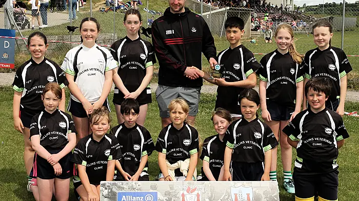 Roinn 10 Mixed runners-up Kilcoe NS with Cork footballer Maurice Shanley. (Photo: Paddy Feen)