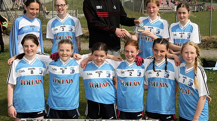 Roinn 5 Girls runners-up Scoil Chúil Aodha - Barr d'Inse with Cork footballer Maurice Shanley. (Photo: Paddy Feen)