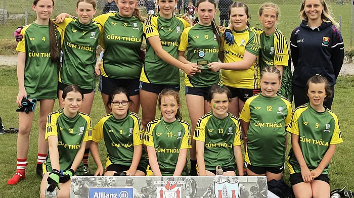 Roinn 4 Girls runners-up Coomhola NS with Cork ladies footballer Laura O'Mahony.