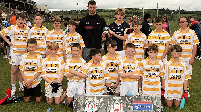 Roinn 2 Boys runners-up Laragh NS with Cork footballer Maurice Shanley. (Photo: Paddy Feen)