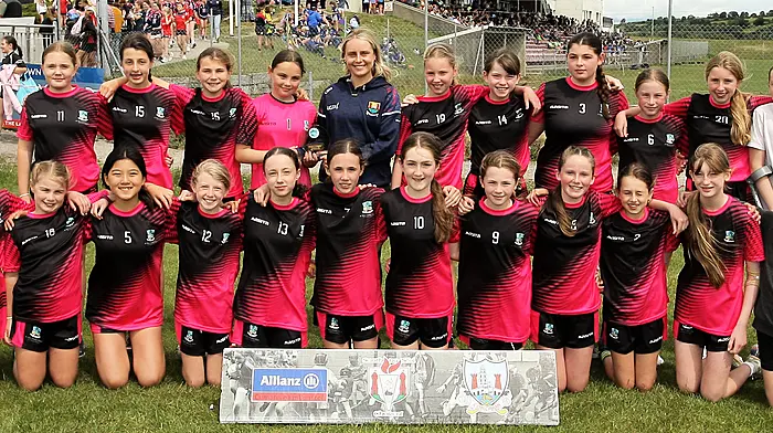 Roinn 3 Girls runners-up St Mary’s Primary School Rosscarbery with Cork ladies footballer Laura O'Mahony.