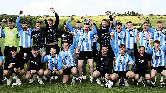 The Baltimore FC team celebrates after being confirmed winners of the O'Brien Water Services.com Championship. (Photo: Paddy Feen)