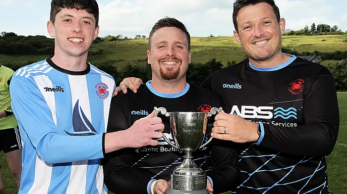 Barry Collins, Kieran Lynch, captain and Dan MacEoin. (Photo: Paddy Feen)