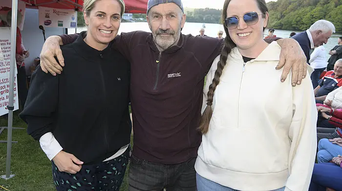 NEWS Pictured at the blessing of the new boat at Killmacsimon Quay rowing club was Bill Bennett with Aisling Dwyer and Ema Hanley. Pcture Denis Boyle