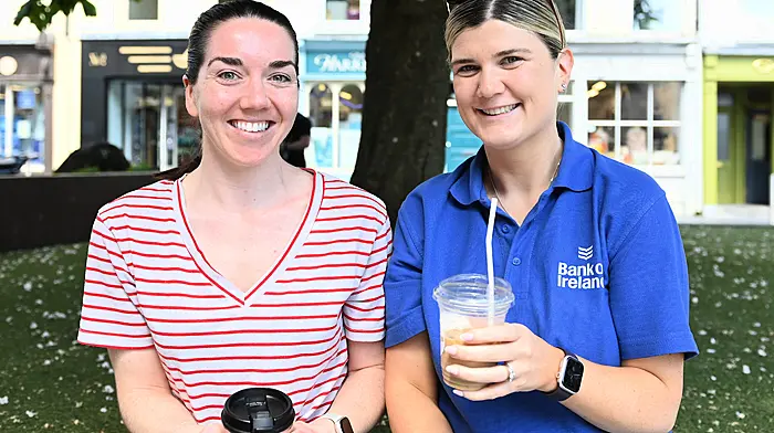 Schull's Adrienne Arundel and Laura Goggin enjoying their lunch break in Astna Square on a recent visit to Clonakilty.  (Photo: Martin Walsh)