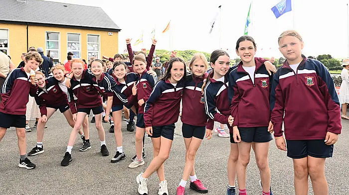 Some of the Timoleague National School pupils having fun as they queued for ice cream during the school's celebration day last Tuesday.  (Photo: Martin Walsh)