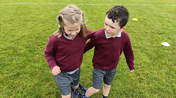 Emma Flynn and Jonathan Holland taking part in the three-legged race at the parish sports day which was organised by Dromore National School and which included the three schools in the parish; Dromore, Caheragh and Dreeny National Schools.