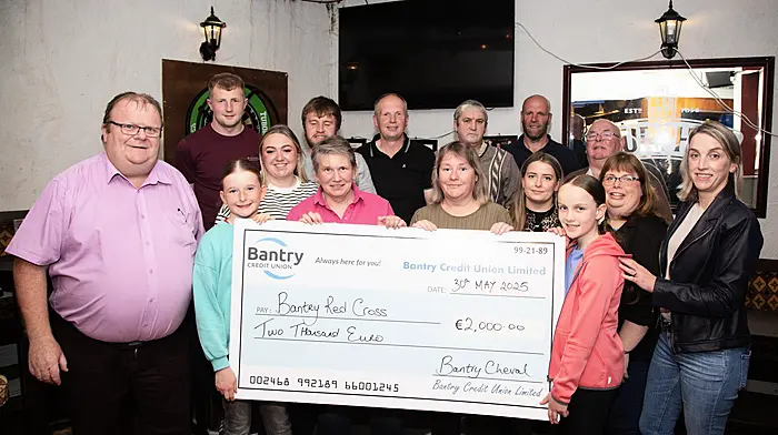 Anna Connolly (left) and Anna O Donovan (right) presenting a cheque of €2,000 to Bantry Red Cross members Lucinda Ross and Claire Mackey, the proceeds raised at the recently held Bantry Cheval. Also included are members of the Bantry and the West Cork Cheval committees.