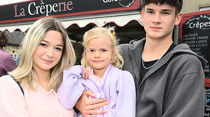 Iwen (left) and Zoe Haida from Clonakilty with Leon Kalinowski at La Creperie durinfg the Friday Market in Kennedy Gardens.   (Photo: Martin Walsh)