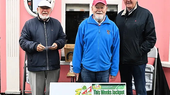 Regular supporter of the Clonakilty Rugby Club lotto Tom Kirby (centre) with club lotto officers Denis Noonan (left) and Jimmy O'Regan at their usual location outside O'Donovan's Hotel, Pearse Street on Friday mornings. (Photo: Martin Walsh)