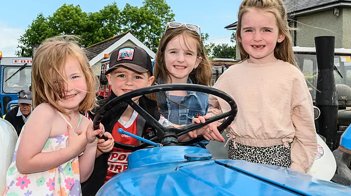 Caith (4), Elliott (5), Clodagh (6) and Eabha (5) Forde (Drimoleague and Dunmanway) checking out a Fordson Super Dexta at the St Mary’s Church’s tractor and car run. The run was held in aid of Cancer Connect and St Mary’s Church Dunmanway. (Photo: David Patterson)