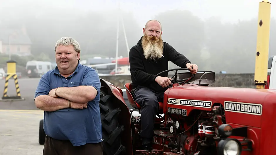 William and David Jones at Schull Pier after unloading the boat. (Photo: Carlos Benlayo)