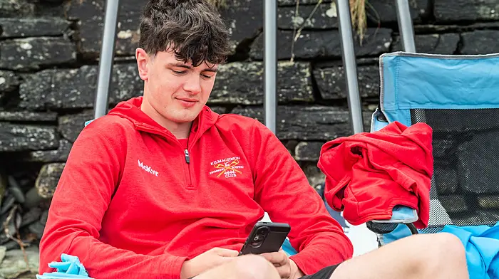 Right: Lyre boy Tommy Collins at the local tractor run. Above: Aaron Nixon from Kilmacsimon at the regatta at Union Hall. (Photos: Andy Gibson)