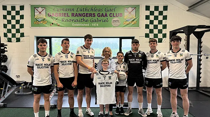 Tracie Nolan recently presented new kits to the Gabriel Rangers GAA club which are  sponsored by Tracie Nolan Solicitors. From left: Chris Moynihan, Mark Cronin, Sean Kelleher, Tracie Nolan, Euan Mc Sweeney, Ross McSweeney, Ryan McSweeney, Fionn Hurley and Gearoid Coughlan.