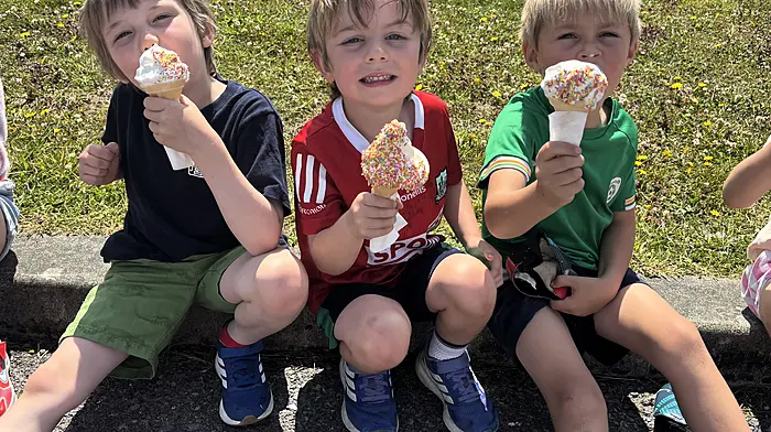 Arlo Burch, Sean Holland and Finn O’Sullivan enjoying an ice-cream during their talent show at Rath National School.