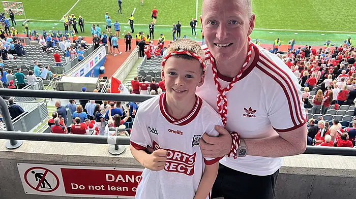 Donal O'Sullivan, from Dunmanway, and his son Oisín supporting Cork in GAA HQ.