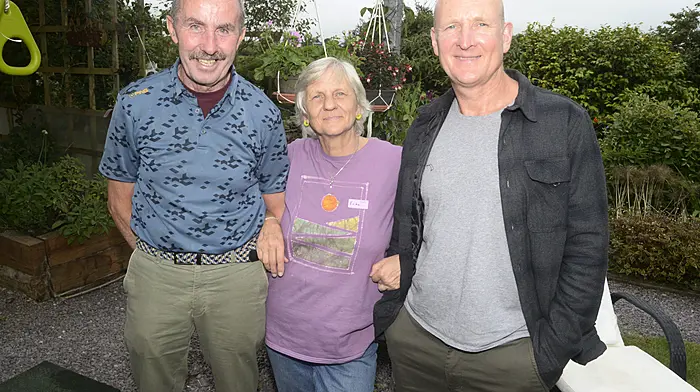 NEWS 29/6/2025 Pictured at an open garden family day fundraiser at Pinetree Lodge Garden and Gallery was Sean O'Donovan, Erika Sexton and Brendan McCarthy. Picture Denis Boyle