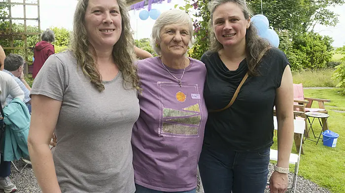 NEWS 29/6/2025 Pictured at an open garden family day fundraiser at Pinetree Lodge Garden and Gallery was Lena O'Connell, Erika Sexton and Claudia Graepel. Picture Denis Boyle