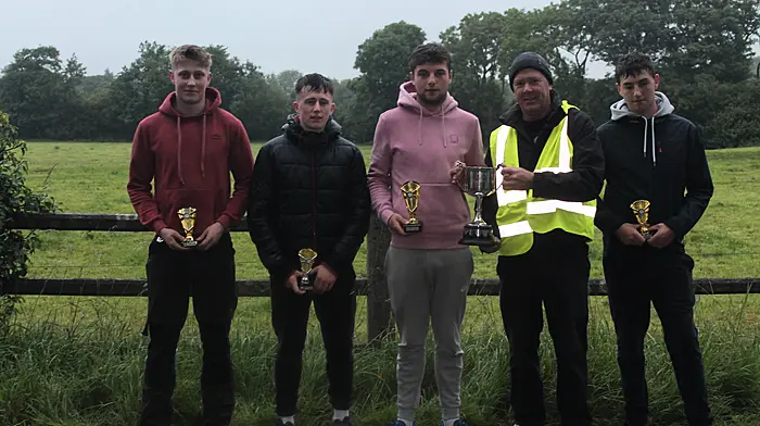 Shane Crowley, Carbery U18 champion, receiving the cup from referee Denis Murphy, Marsh Road Committee. From left: Niall O’Driscoll (semi-finalist), Sean Cuinnea (final runner-up), Shane Crowley (winner) and Eoin Crowley (semi-finalist)
