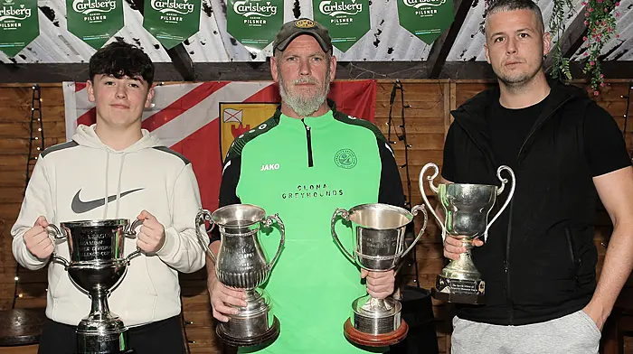 Clonakilty Soccer Club team joint-manager John Leahy with his sons Logan and Jonathan.