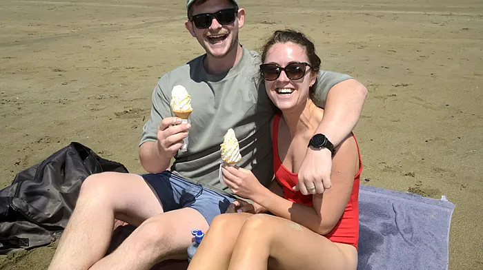 NEWS 11/7/2025 Pictured celebrating their engagement at the beach at Garretstown Co Cork was Luke Holland from Ballinadee with Trish Donovan from Barryroe. Picture Denis Boyle