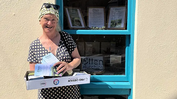 Clare Heardman out and about on a sunny day delivering flyers to promote the upcoming Ellen Hutchins Festival, which will be held from August 16th to 24th. Thanks was expressed to the Bantry Credit Union for the wonderful display in the window which showcases the festival.