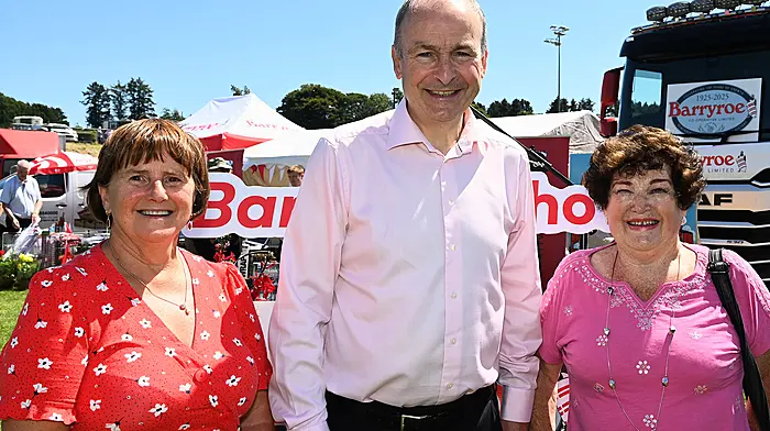 An Taoiseach Micheál Martin at the 67th Barryroe Show in Pairc Uí Mhurchú, Barryroe with Ann Murphy (left) and Ailish Crisp. The Barryroe GAA complex is named after Ann's late husband Paddy, while Ailish returns from England each year to attend the show.   (Photo: Martin Walsh)