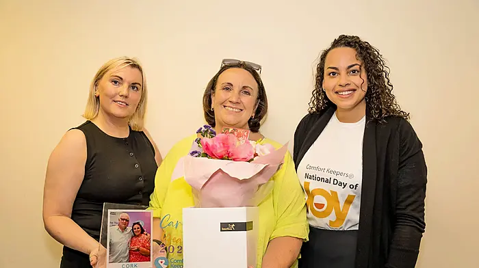 At the Comfort Keepers National Day of Joy are Tippula Mangan (branch manager Cork), Carrigaline's Irene O’Neill (regional winner of this year’s Comfort Keepers Carer of the Year award), and Connie Nolan (area manager Cork)