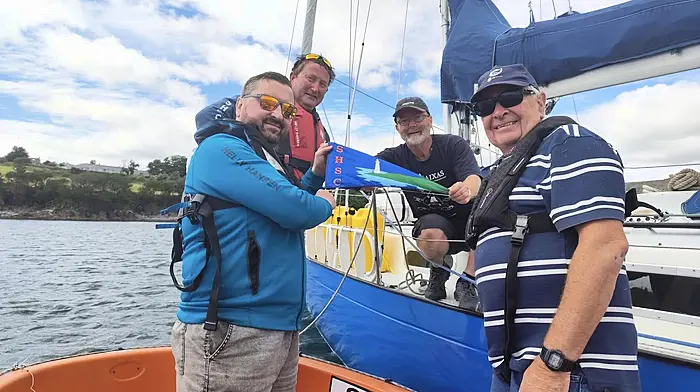 Schull’s ex postmaster, Thomas Newman, is setting off on a big adventure to satisfy his wanderlust and love of sailing. Everyone wishes him well and safe passage as he sails to the Azores in his beloved Contessa 32, Sitelle.  Thomas has planned for months and the stars have aligned with fair weather for his solo voyage south.  Mark Murphy, John McGowan and John Molloy of the SHSC went out in the club tender to present Tom with a club burgee before he weighs anchor.