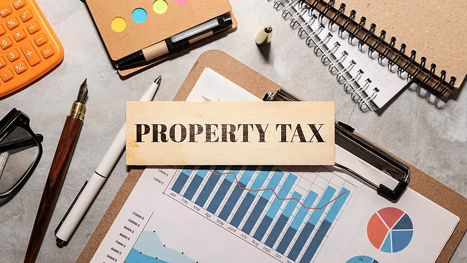 Property tax hike a blow for home owners Image