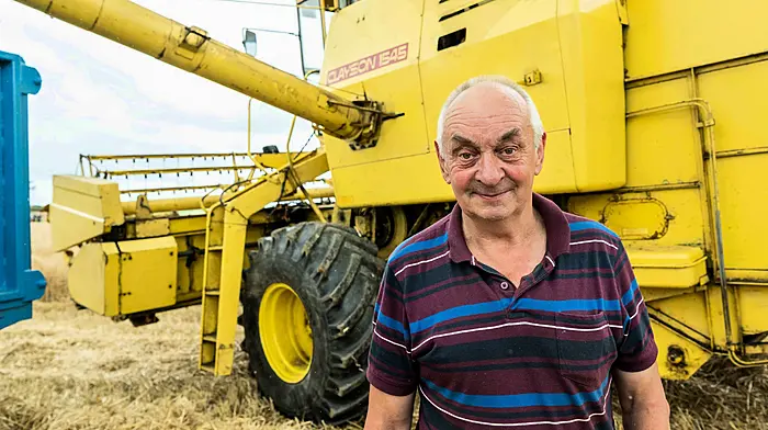James Swanton from Bantry with his 1972 New Holland 1545 combine harvester at The West Cork Vintage Ploughing & Threshing Association's day last Sunday.  (Photo: Andy Gibson)