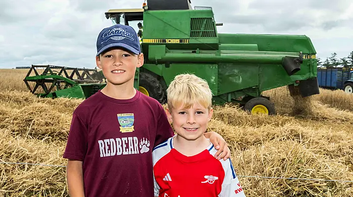 James and Dylan Egan (Clonakilty) enjoying a day out at the West Cork Vintage Ploughing & Threshing Association’s annual vintage harvest day which was held last Sunday.  (Photo: Andy Gibson)