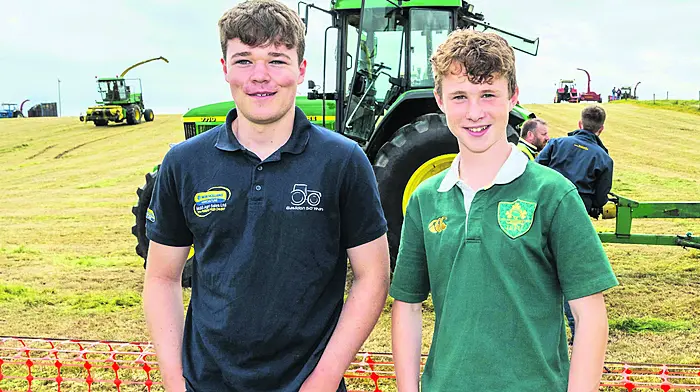 Eoin McCarthy (Kilbrittain) and Sean Fitzgerald (Lislevane) enjoying the vintage harvest day in Clonakilty last Sunday which was hosted by the West Cork Vintage Ploughing & Threshing Association.  (Photo: Andy Gibson)