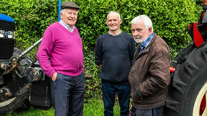 Jerry O'Mahony (Bantry), Gerard O'Callaghan (Beal ná Blath) and Denis O'Donovan (Dunmanway) talking all things tractors before the tractor run held in Ballydehob recently by the Mizen Vintage Club.  (Photo: Andy Gibson)