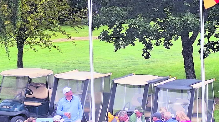 Some members of the German golfing party enjoyed a post-round drink after a challenging round on the course at Castlebernard.  Three flags were flown on the day, the Tricolour, the European flag and the German national flag.