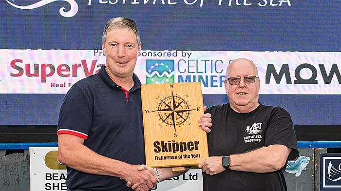 Wiilliam Power Winner of the Skipper Fisherman of the year Competition at the Castletownbere Festival of the Sea. William Power is presented  his prize by editor ot The Skipper Niall Duffy Picture: Anne Marie Cronin Photography